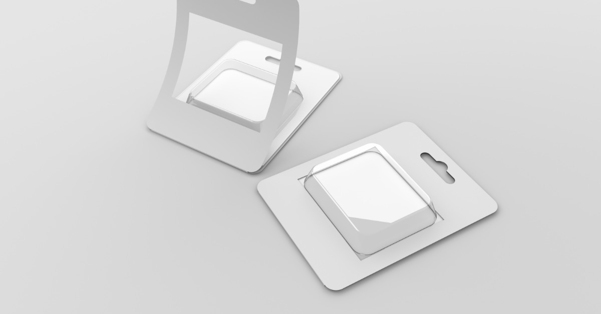 Two packages on top of a white background. The packaging has a white cardboard backing with a clear plastic tray in the middle.